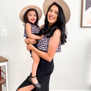 Beautiful mommy & me leopard matching dresses.You get both outfits for the price